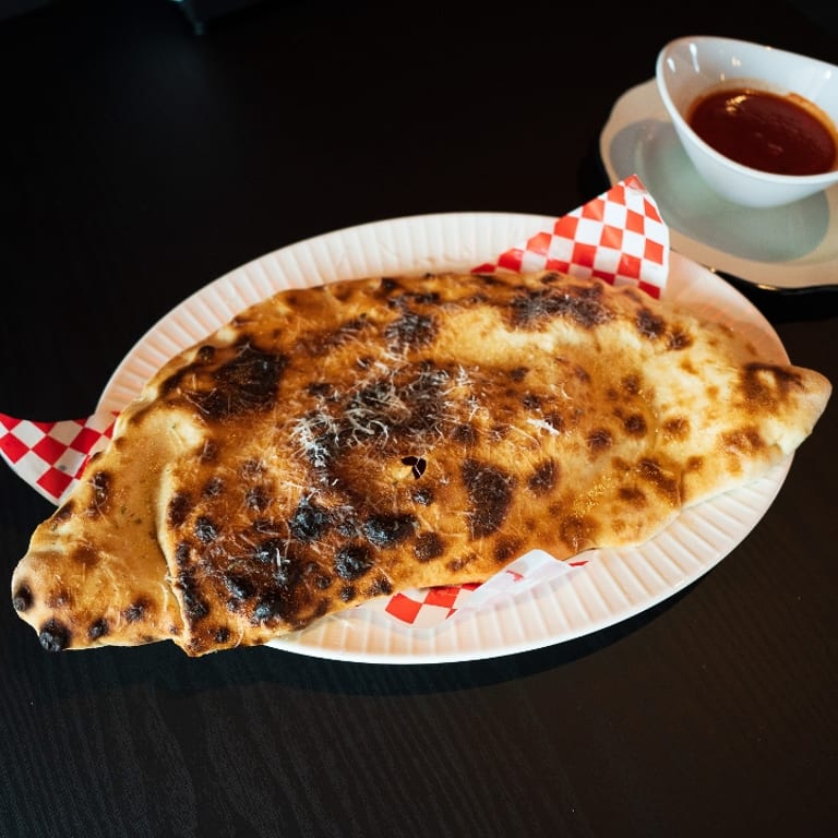 Savor Our Calzone